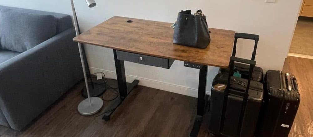 Electric standing desk assembled in a Boston apartment