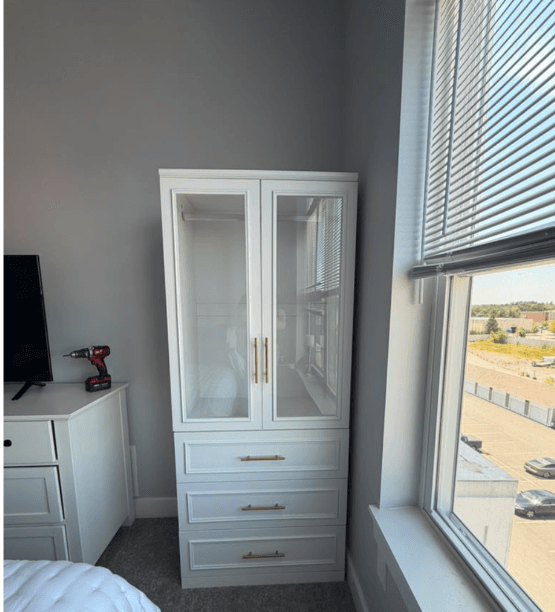 White cabinet assembly and installation by Boston Handyman Co. in Boston
