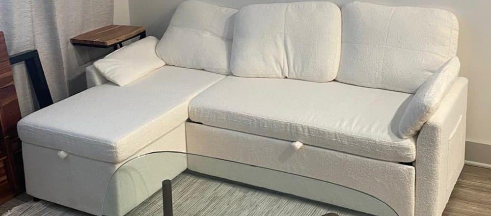 White sectional sleeper sofa assembled in a Boston living room