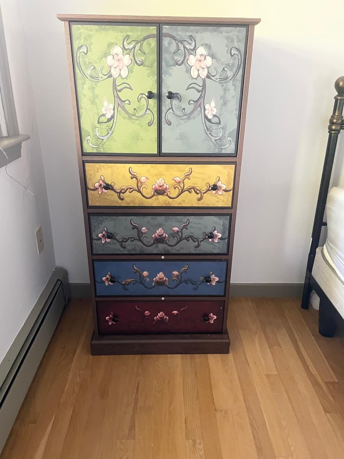 Hand-painted floral dresser assembled and styled in a Boston bedroom